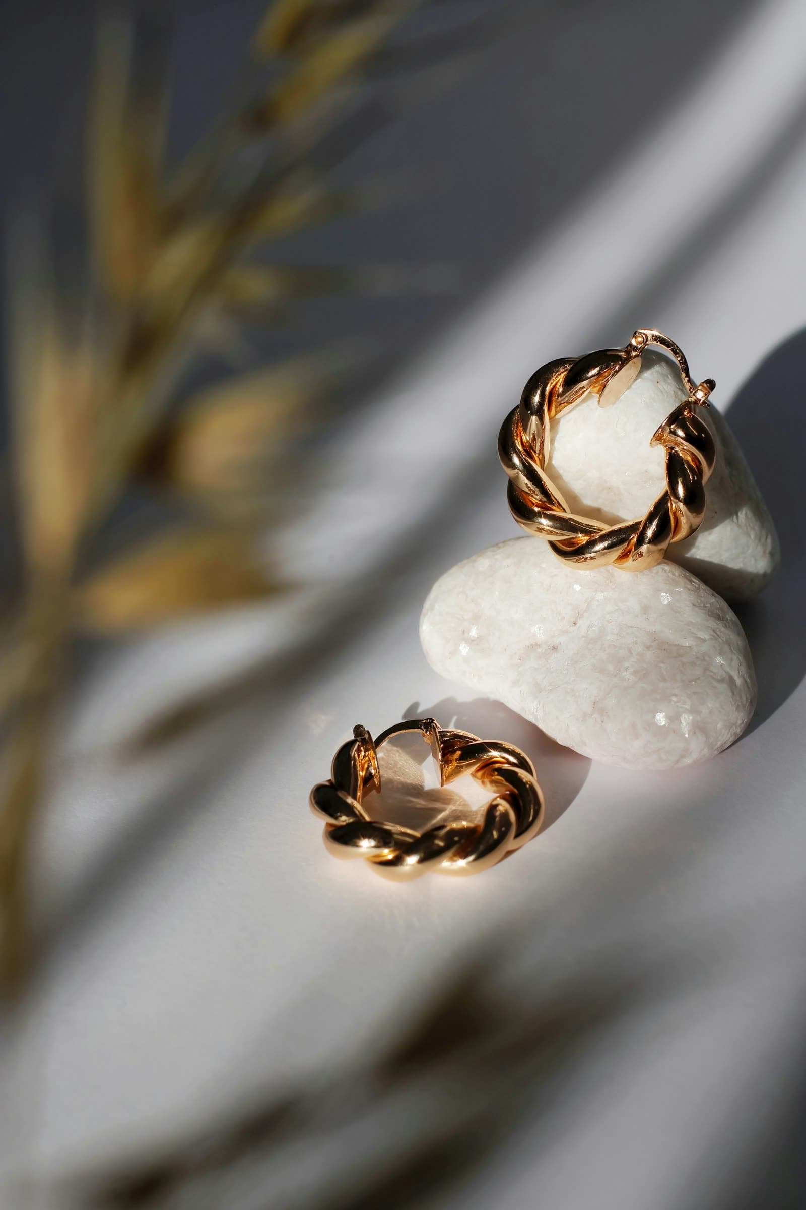 Statement ring with a green center stone and a halo of smaller stones